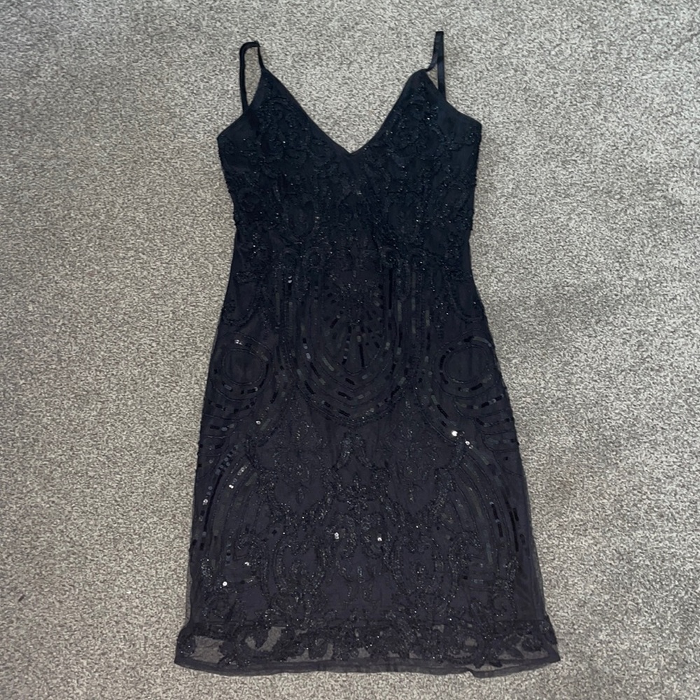 Detailed slight open back spaghetti strap